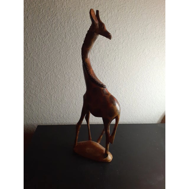 This is a GORGEOUS Handcarved Wood 15" Giraffe Figurine Likely Made in Kenya. Other Handcarved figurines from Kenya sold...