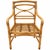 Beautiful pair of vintage McGuire San Francisco rattan armchairs featuring sculptural crossed backs, wrapped joints, woven...