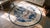 Pretty Floral Design in a Ivory Field & Navy Border Color Antique Round Chinese Peking Rug For Sale - Image 9 of 9