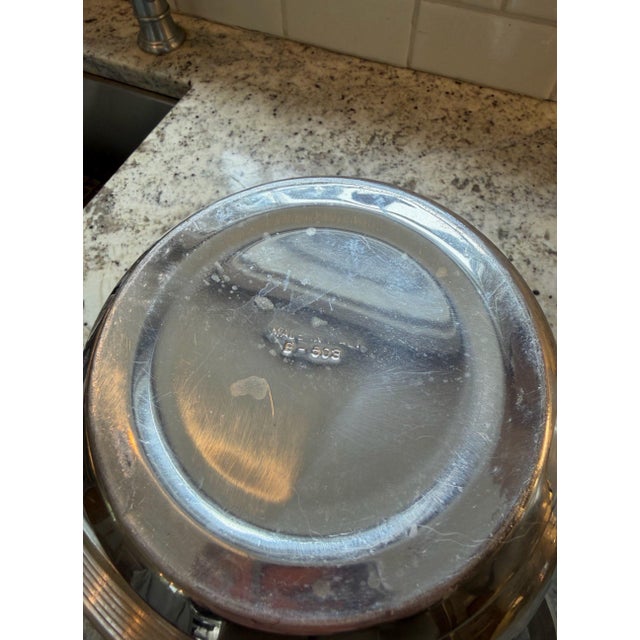 Vintage Italian hammered aluminum ice bucket. Era Mid-century modern. Size is 12.5" high x 9" in diameter. In good...