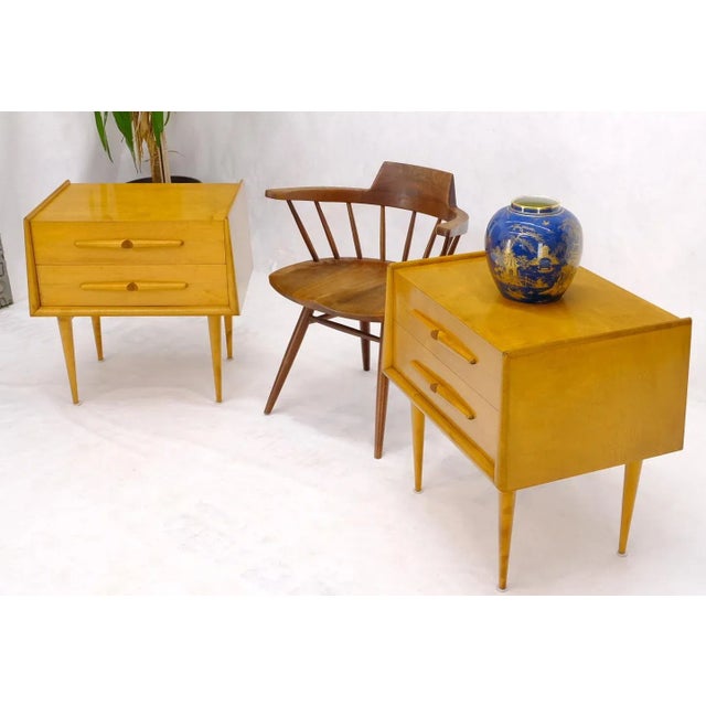 Pair of Swedish Mid-Century Modern honey amber tone two drawers night stands end tables by Edmond Spence.