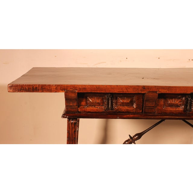 Superb and rare 17th-century Spanish Renaissance-era walnut console table. This table features a beautiful lyre-shaped...