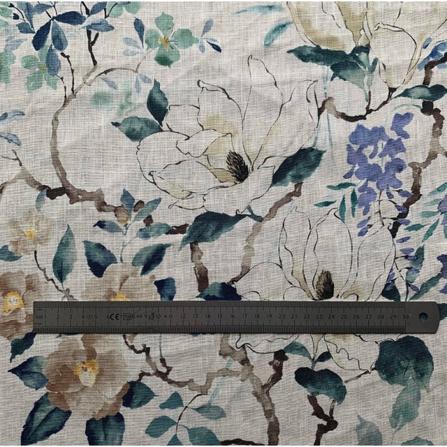 The Sanderson Magnolia & Blossom Leaf Fabric is a luxurious and high-quality material perfect for upholstery projects....