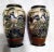 A striking mirrored pair of mid-century Japanese Satsuma-style porcelain cabinet vases, featuring intricate hand-painted...