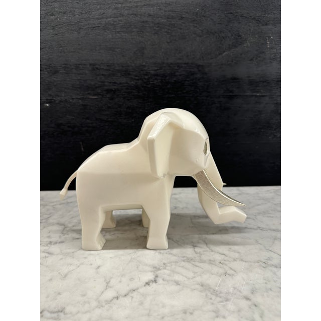 A rare limited-edition White Elephant sculpture by contemporary artist Johnathan Schultz, created as part of his Gemesis...