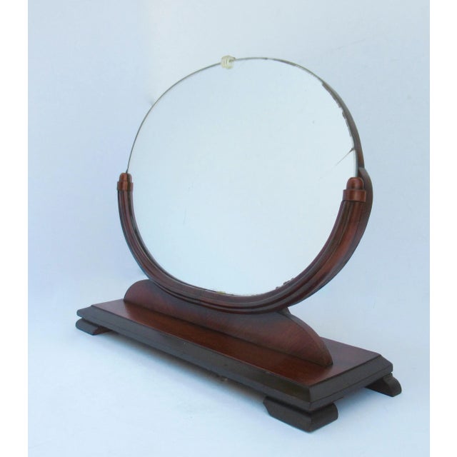 Vintage; Art-Deco-inspired, Neoclassical table top, vanity mirror. Mirror is supported by a beveled wood base, with...