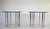 Vintage Hollywood Regency style brass and chrome plated side or end tables. Each features thick glass top and eight legs...