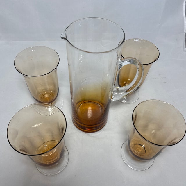 These gorgeous glasses fit in your hand like a dream. Four hand blown amber glass goblets 6.5 “ Tall. With wide almost 4”...