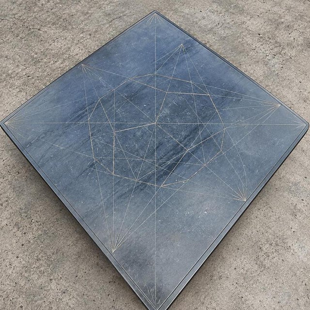Weighty coffee table / solid iron frame / stone slate table tops / made on commission by architect Alex Vervoordt /...