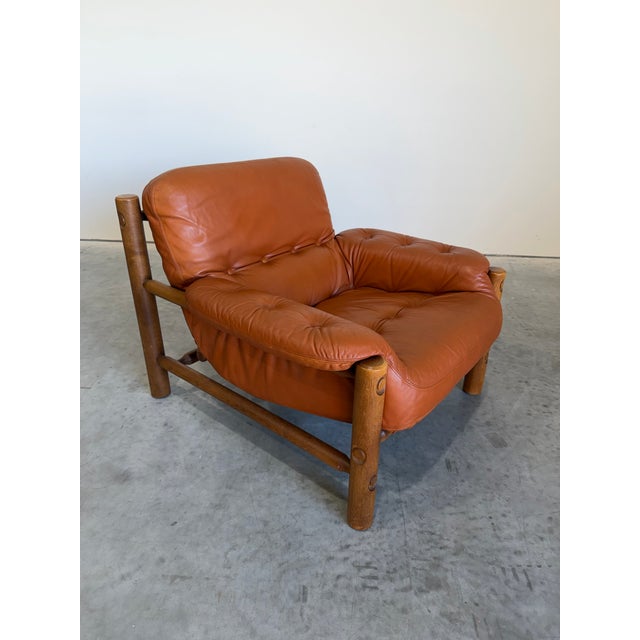 1970’s Brazilian Modern style Lounge Chair in Cognac leather and Oak frame. A nod to Percival Lafer, Jean Gillon and Arne...