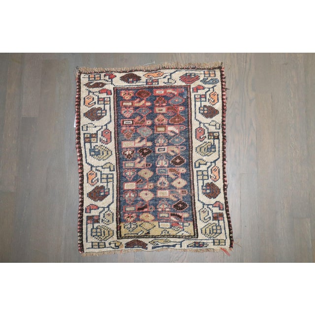 an early 20th century Kurd Mini size rug