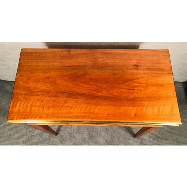 Biedermeier card or console table, South German 1820. The table has beautiful walnut veneer on top, sides and legs. The...