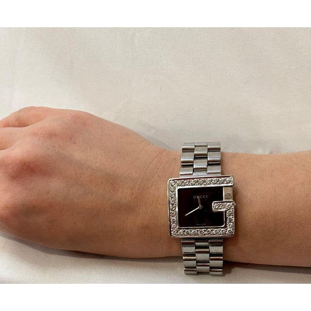 Auth Gucci stainless Steel diamond “G” Bezel watch Gucci Silver Stainless Steel Black Dial 3600 Swiss Water Resistant...