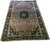 This antique rug is a true gem for any collector or home decor enthusiast. The beautiful floral pattern in shades of...