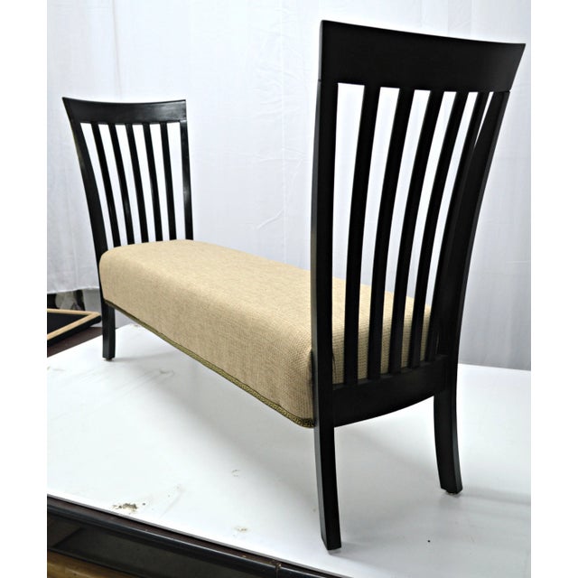 Large modernist bench with refinished wood frame in a black satin enamel and newly upholstered seat. Seat, 17"H.