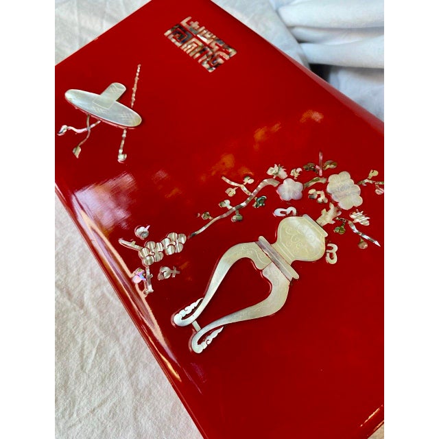 Striking mid-century Korean smoking box in a rich, high-gloss tomato red lacquer, exquisitely inlaid with iridescent...