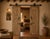 Antique Indian carved teakwood door, c. 1880–1900, carefully bleached to highlight its sculptural carvings and lighten the...