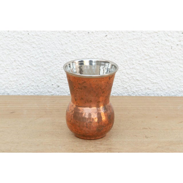 This petite vessel features the classic silhouette of a traditional Indian "Lassi Cup"—flared at the rim and bulbous at...