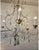 Chandelier inspired by the rustic, old-world design traditions of the Tuscany region in Italy. It’s meant to evoke the...