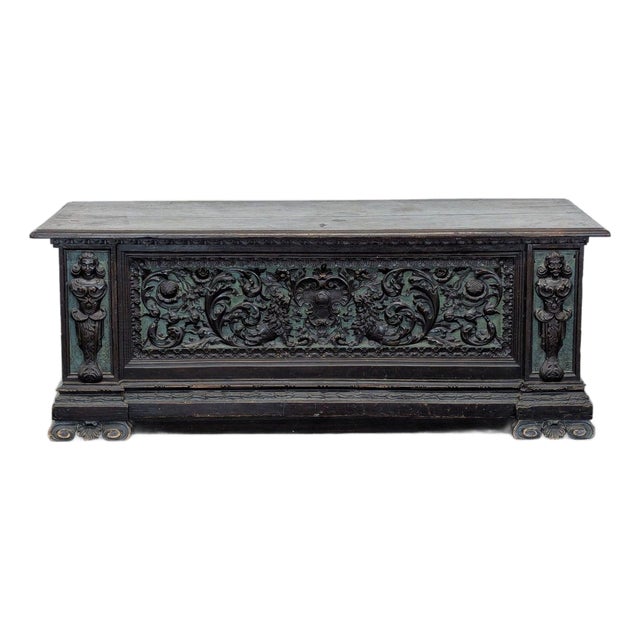 Antique Wooden Trunk With Ornate Carved Details and Hinged Lid For Sale
