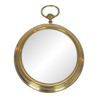 Large brass mirror representing a pocket watch. French work. Circa 1970 For Sale