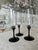 Raise a glass to timeless style. This trio of vintage champagne flutes features sleek black stems and crystal-clear...