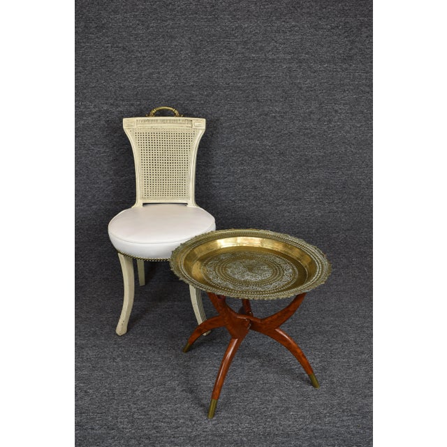 Pie crust edged shape, decorative hammer forged brass tea tabletop, with Asian symbolic animal motifs phoenix/dragon,...