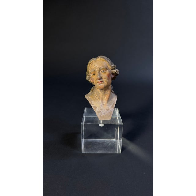 Neapolitan nativity scene puppet head from the late 18th century. This polychrome terracotta sculpture depicts the face of...