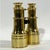 Exceptional pair of polished and lacquered English Marine binoculars. Rare amber filtered lenses. Geared focal knob. Clear...
