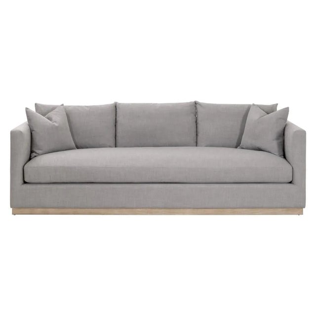 Siena 96" Gray Oak Sofa Experience unparalleled comfort and sophistication with the Siena 96" Gray Oak Sofa by Essentials...