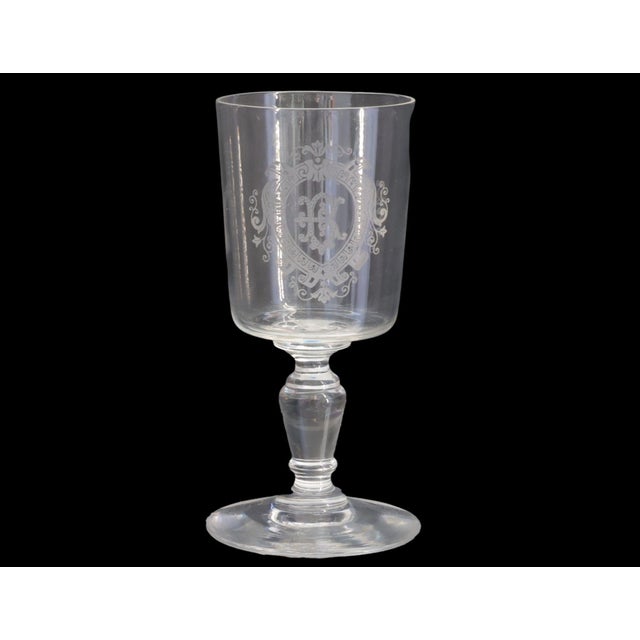 Set of eight late 19th century French stemware glasses featuring finely etched “B” monograms within ornate crest...