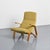 Grasshopper chair designed by Eero Saarinen in 1946 for Knoll. Its frame in bent beech plywood creates a continuous line...