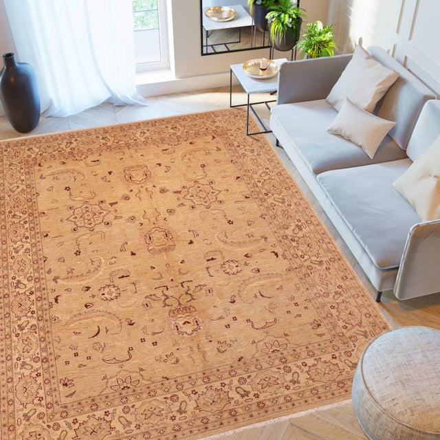 "Enhance the ambiance of your home with this magnificent Persian-influenced Turkish hand-knotted rug made by skilled...