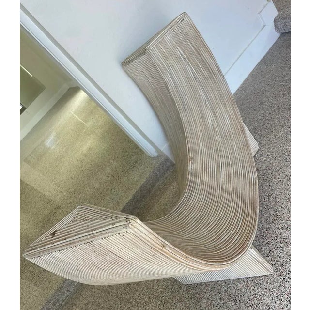 Rare and eye catching pencil reed console table. Perfect for a large entry or a statement for any wall. In the manner of...