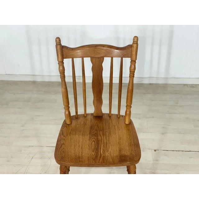 Charming wooden chair in the timeless Windsor/country style. The chair impresses with its solid construction from warm-...