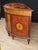 Sumptuos pair of Regency style demi-lune cabinets in the manner of Harewood House Crafted from satinwood with mahogany and...