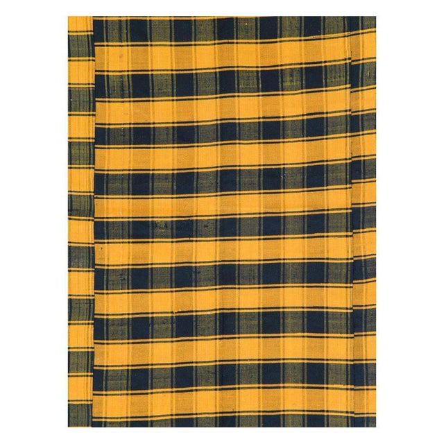 A vintage Turkish flat-weave Kilim room size accent rug handmade during the mid-20th century with a plaid design in...