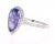 This ring has a electrifying Pear Cut bright purplish blue Tanzanite weighing 3.73 Carats. The traditional halo setting...