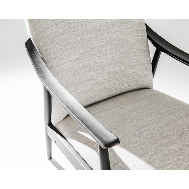 This pair of 1960s Czech Wooden Armchairs captures the essence of minimalist design with a modernist flair. Crafted with...