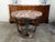 A French Art Deco period center table from the early 20th century in the manner of Raymond Subes, with steel scrolling...