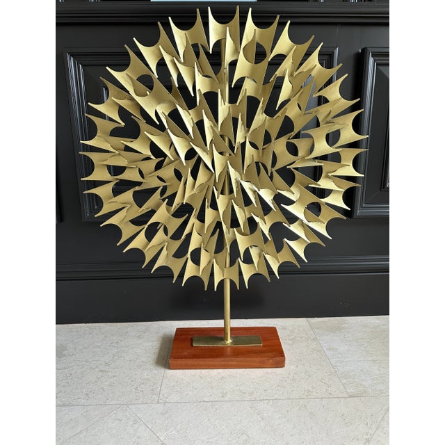 Very large vintage brutalist sun sculpture in the manner of Marc Weinstein. Very dramatic, measuring 24.75”w x 5.5”d x...