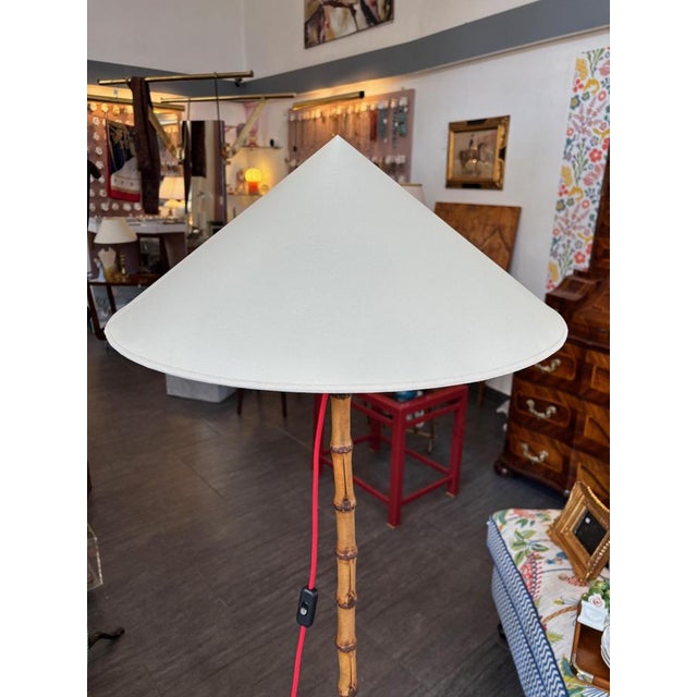 Floor lamp "tilting lamp", Carl Auböck, Vienna, circa 1950 Single-light bamboo stem, brass fittings Height: approx. 145...