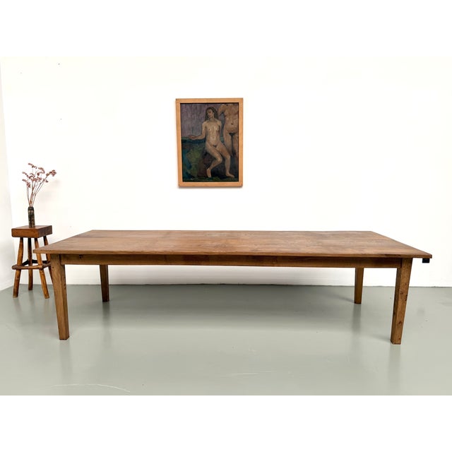 Maison lecan presents this magnificent 1950s solid oak farmhouse table. A truly rare piece due to its size and unique...