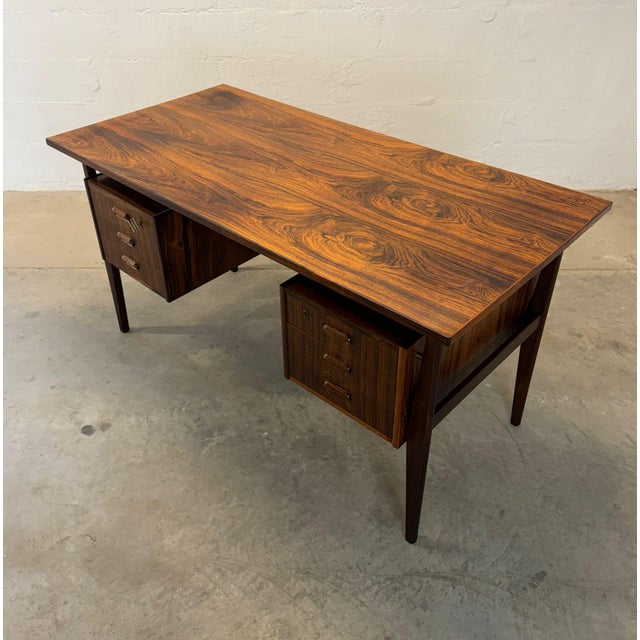 Dimensions: 55 1/8" L x 27 3/16" W x 28 3/4" H Origin: Denmark Designer: Gunnar Nielsen Tibergaard Manufacturer:...