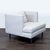 This CB2 lounge chair features a clean, modern design with soft light gray upholstery and sleek metal legs. Its deep seat...