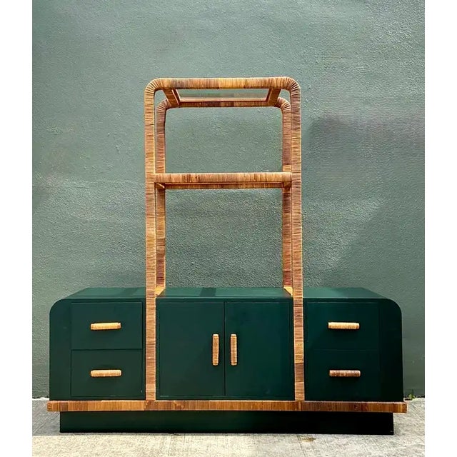 This vintage wrapped rattan etagere and laminate credenza brings together sculptural texture, generous storage, and a...