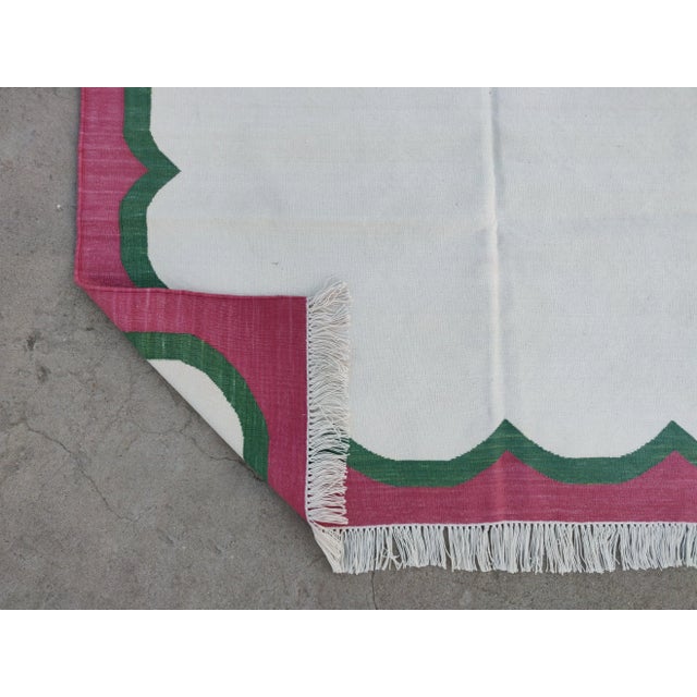 Casa Cosima Handmade Cotton Cream, Forest Green and Raspberry Pink Washed Border Scalloped Rug For Sale - Image 4 of 11