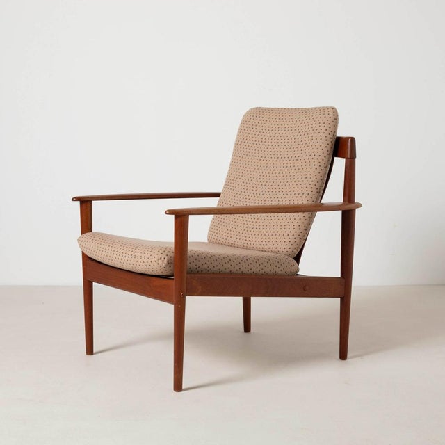 Danish teak armchair by Grete Jalk for Poul Jeppesen, 1960s Very good, original condition with no restoration. Wool...
