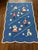 Charming handmade child’s quilt featuring Dutch dancers, toy soldiers, ducks, pigs, cottages, flowers, and stars appliquéd...