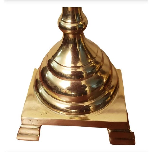 Pair of extra tall brass candlesticks with a lovely shaped column rising from a shaped stepped base, each still retaining...
